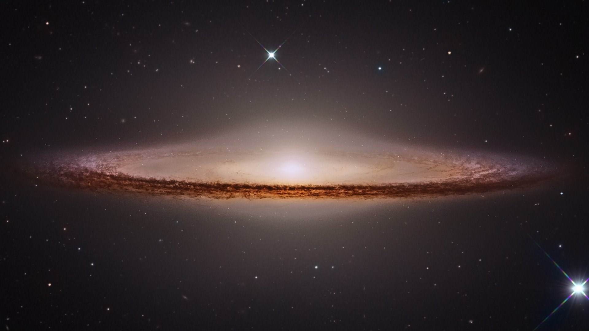 M104, Sombrero, HST + Subaru, 5 Feb 2015, NASA, ESO, NAOJ, Giovanni Paglioli, Proc R Colombari_m104colombari_q100_watermark_B_1920w_1080h